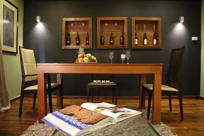 Imagen de la habitación del Hotel Andromeda Suites and Apartments. Foto 11