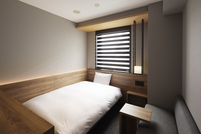 Imagen de la habitación del Hotel Androoms Shin-osaka. Foto 6