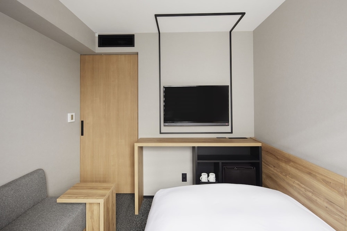 Imagen de la habitación del Hotel Androoms Shin-osaka. Foto 7