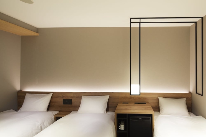 Imagen de la habitación del Hotel Androoms Shin-osaka. Foto 9