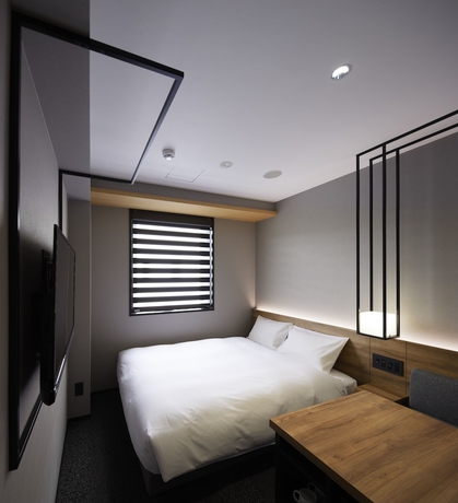 Imagen de la habitación del Hotel Androoms Shin-osaka. Foto 10
