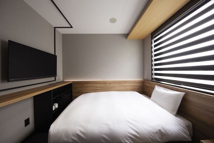 Imagen de la habitación del Hotel Androoms Shin-osaka. Foto 12