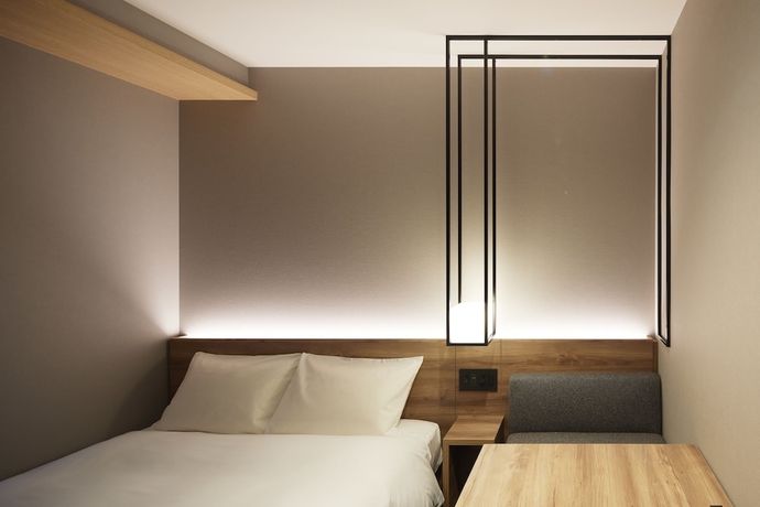 Imagen de la habitación del Hotel Androoms Shin-osaka. Foto 13