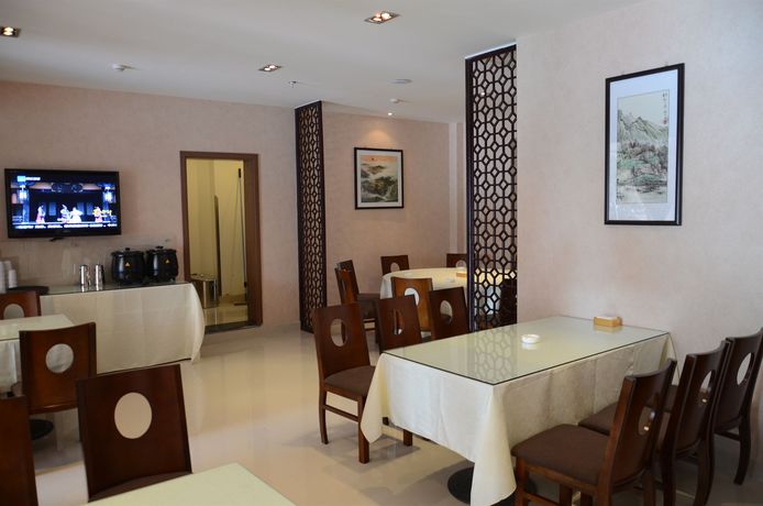 Imagen del bar/restaurante del Hotel Ane - E Mei Branch. Foto 3