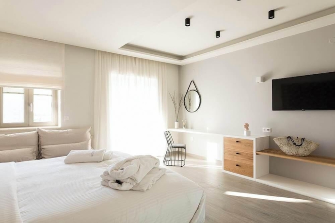 Imagen de la habitación del Hotel Anemolia Parga Suites. Foto 12