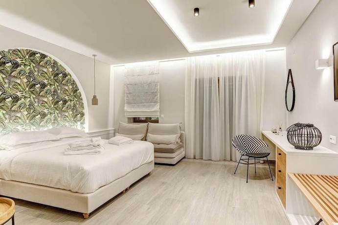 Imagen de la habitación del Hotel Anemolia Parga Suites. Foto 15