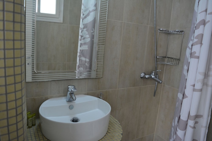 Imagen de la habitación del Hotel Anemomilos Villa. Foto 18