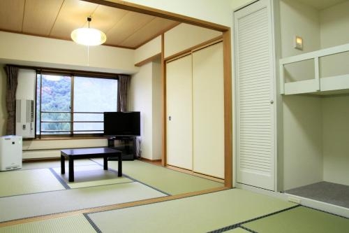 Imagen de la habitación del Hotel Angel Grandia. Foto 6