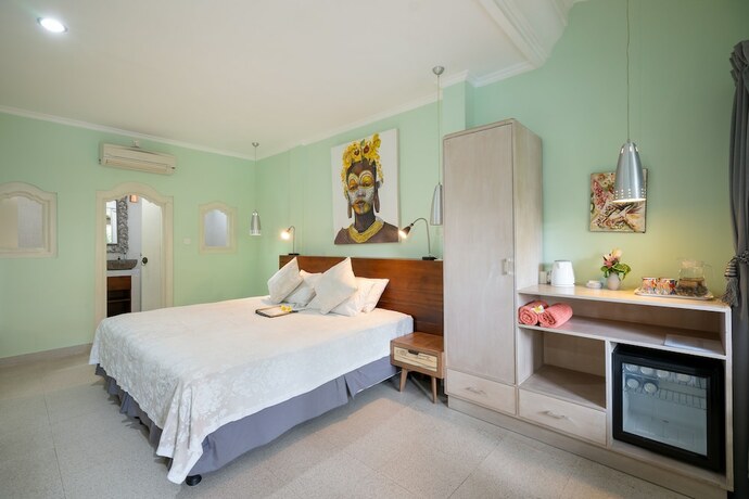 Imagen de la habitación del Hotel Angel House Ubud. Foto 16
