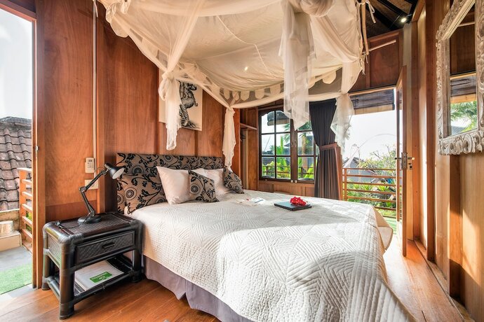 Imagen de la habitación del Hotel Angel House Ubud. Foto 18