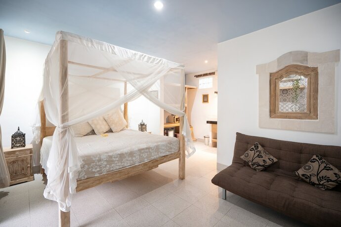 Imagen de la habitación del Hotel Angel House Ubud. Foto 34