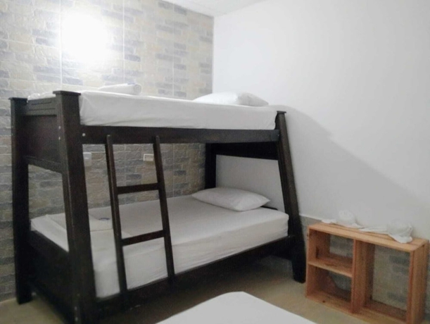 Imagen de la habitación del Hotel Angel Maria. Foto 5