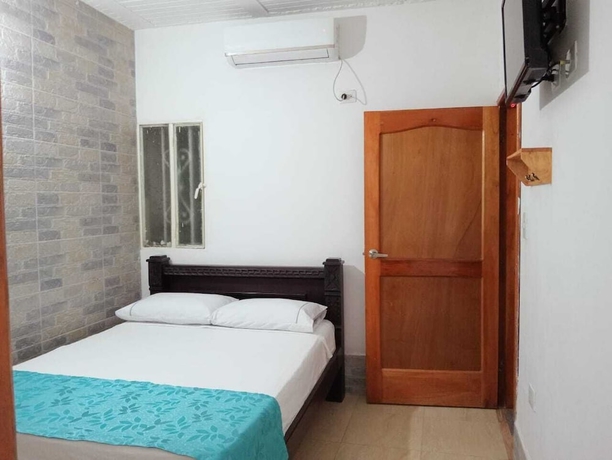 Imagen de la habitación del Hotel Angel Maria. Foto 9