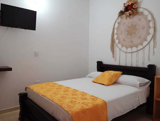 Imagen de la habitación del Hotel Angel Maria. Foto 11