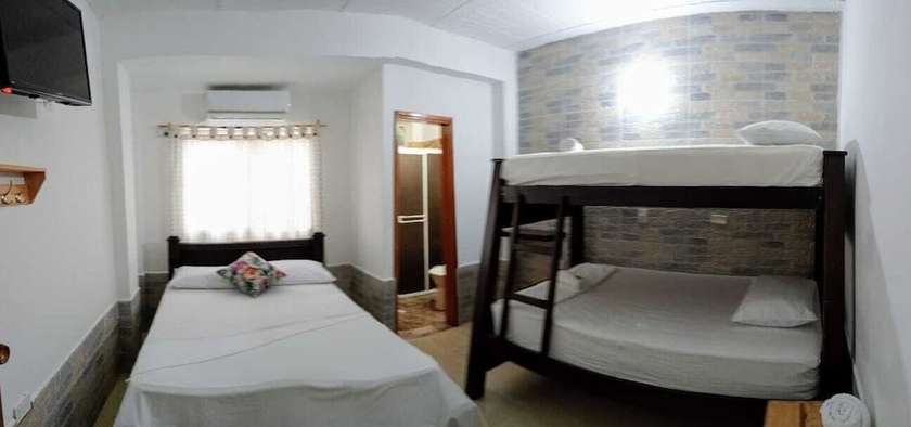 Imagen de la habitación del Hotel Angel Maria. Foto 12