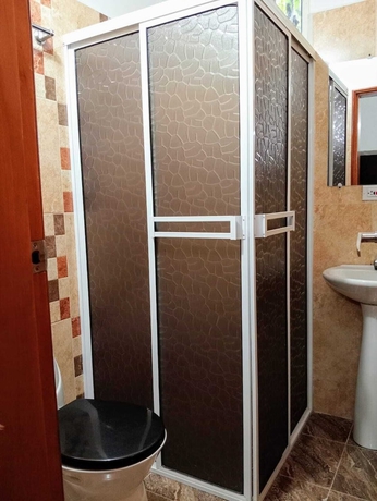 Imagen de la habitación del Hotel Angel Maria. Foto 13