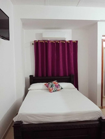 Imagen de la habitación del Hotel Angel Maria. Foto 16