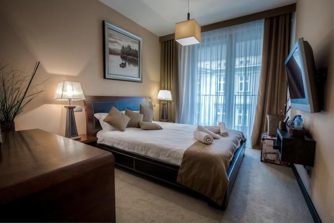 Imagen de la habitación del Hotel Angel Plaza Apartments. Foto 2