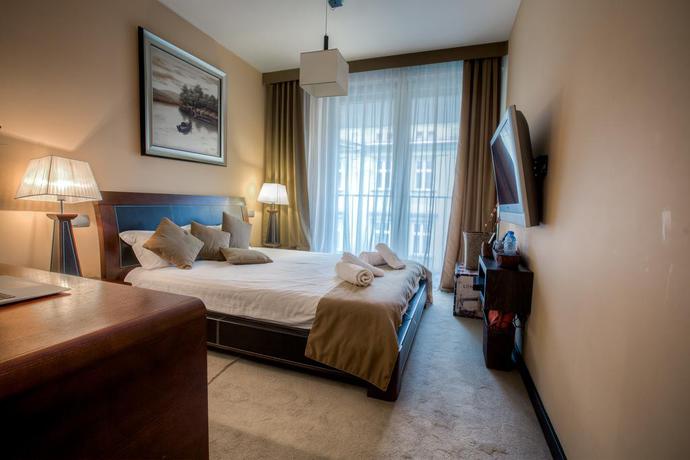 Imagen de la habitación del Hotel Angel Plaza Apartments. Foto 7