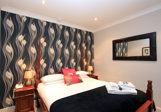 Imagen de la habitación del Hotel Angel and Royal. Foto 8