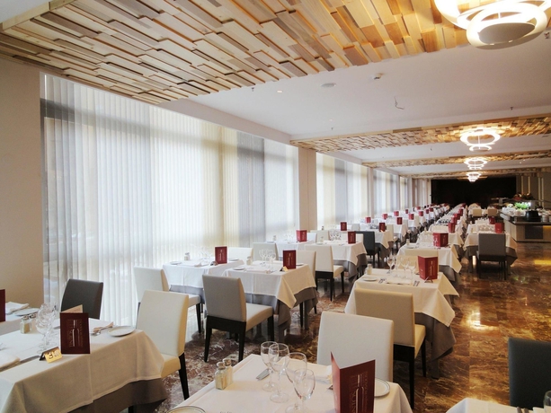 Imagen del bar/restaurante del Hotel Angela - Adults Recommended. Foto 5