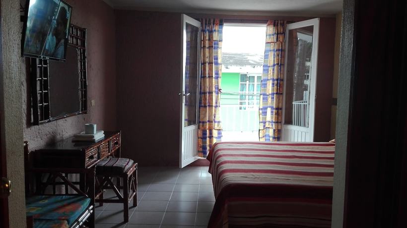 Imagen de la habitación del Hotel Angela Carolina. Foto 17