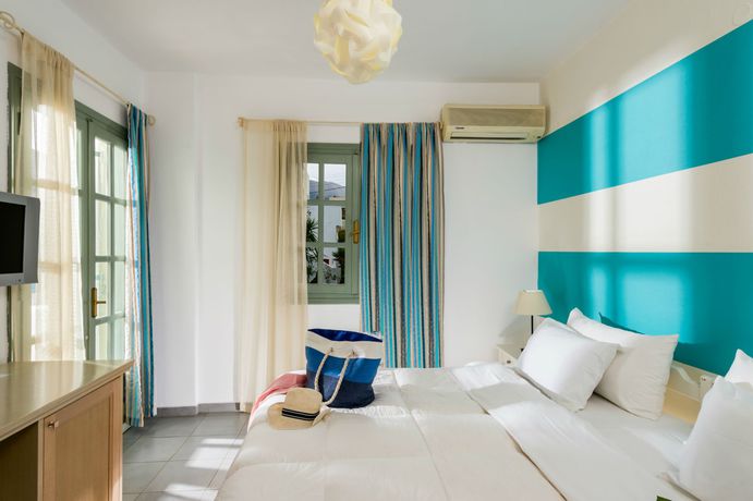 Imagen de la habitación del Hotel Angela Suites. Foto 13