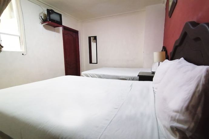 Imagen de la habitación del Hotel Angeles. Foto 8