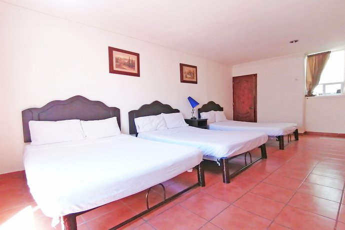 Imagen de la habitación del Hotel Angeles. Foto 16