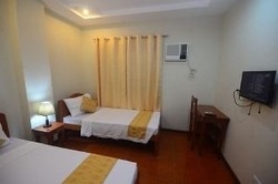 Imagen de la habitación del Hotel Angelic Mansion. Foto 7