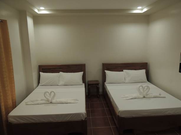 Imagen de la habitación del Hotel Angelic Tourist Inn. Foto 10