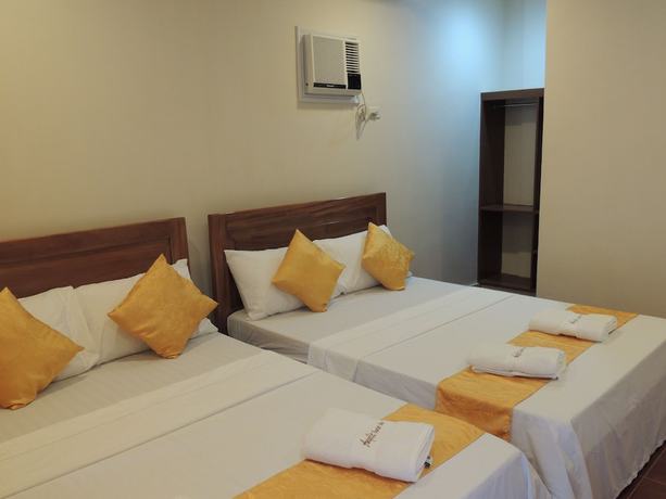 Imagen de la habitación del Hotel Angelic Tourist Inn. Foto 16