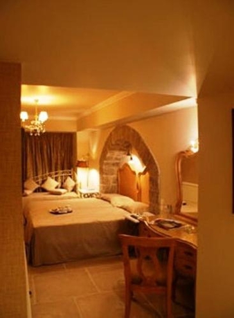 Imagen de la habitación del Hotel Angelica Boutique. Foto 9