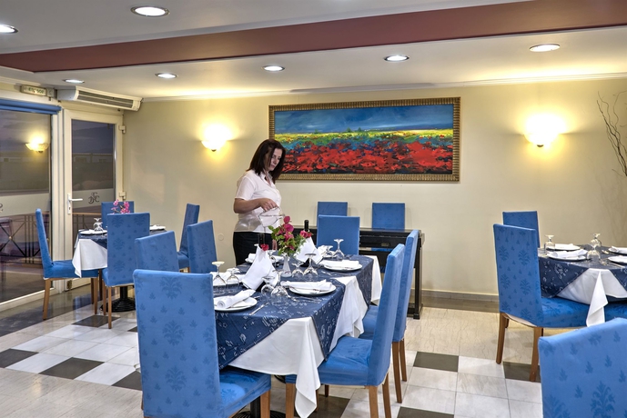 Imagen del bar/restaurante del Hotel Angelika Pallas. Foto 3