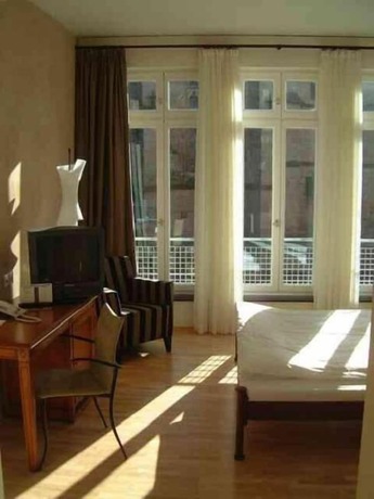 Imagen de la habitación del Hotel Angels - Das Am Fruchtmarkt. Foto 11