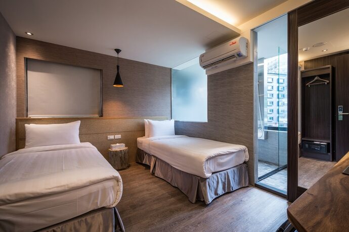Imagen de la habitación del Hotel Angels Inn Jiaoxi Hotspring. Foto 19