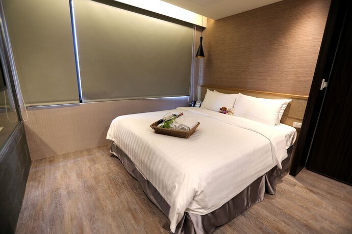 Imagen de la habitación del Hotel Angels Inn Jiaoxi Hotspring. Foto 20