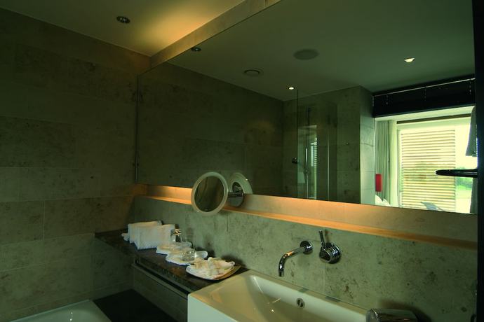 Imagen de la habitación del Hotel Angels - das am Golfpark. Foto 16