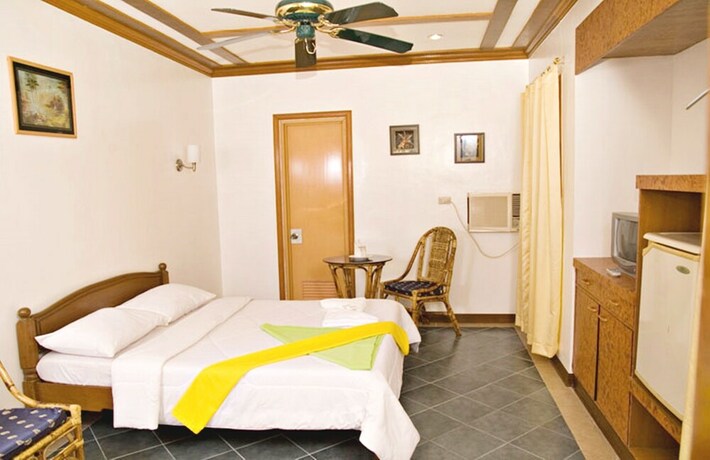 Imagen de la habitación del Hotel Angelyn's Dive Resort. Foto 24