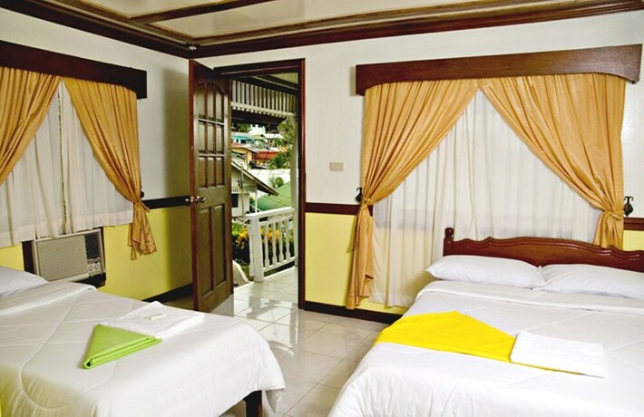 Imagen de la habitación del Hotel Angelyn's Dive Resort. Foto 26
