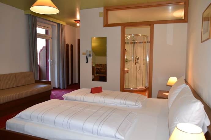 Imagen de la habitación del Hotel Angerburg Blumenhotel. Foto 6