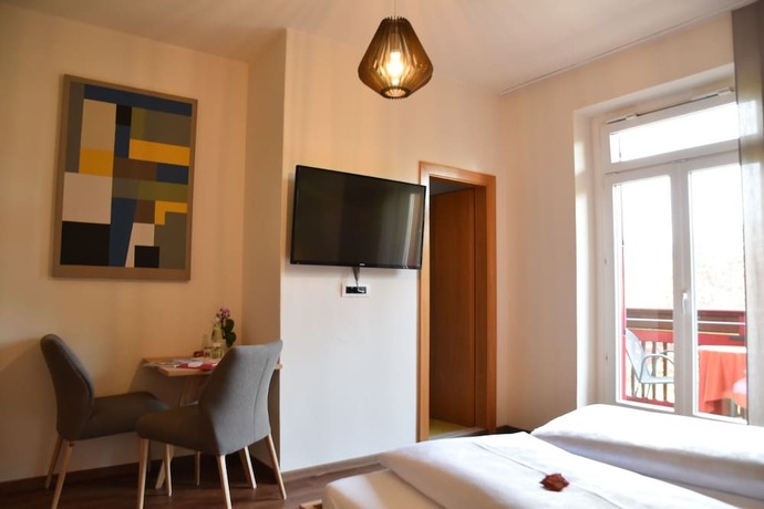 Imagen de la habitación del Hotel Angerburg Blumenhotel. Foto 7