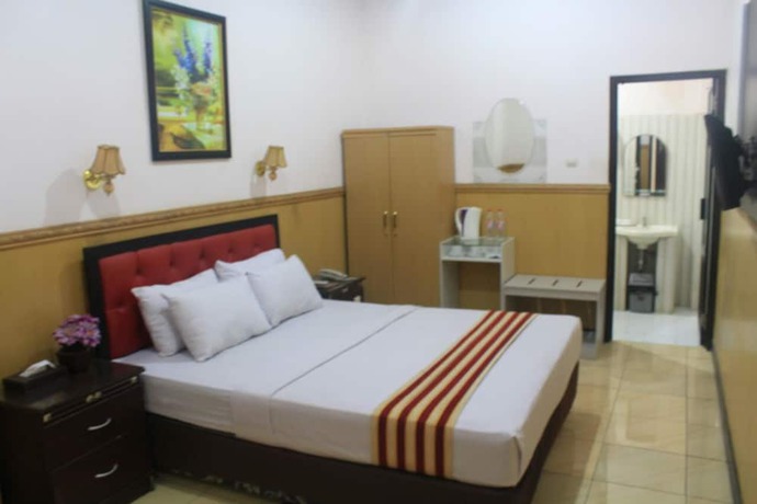 Imagen de la habitación del Hotel Anggraeni Ketanggungan. Foto 6