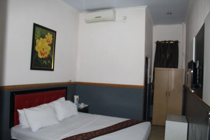 Imagen de la habitación del Hotel Anggraeni Ketanggungan. Foto 9