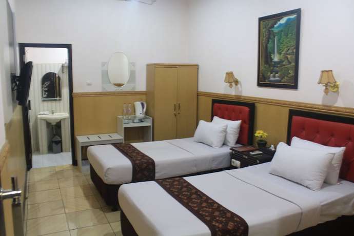 Imagen de la habitación del Hotel Anggraeni Ketanggungan. Foto 15