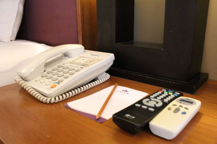 Imagen de la habitación del Hotel Anggrek Shopping Hotel. Foto 7