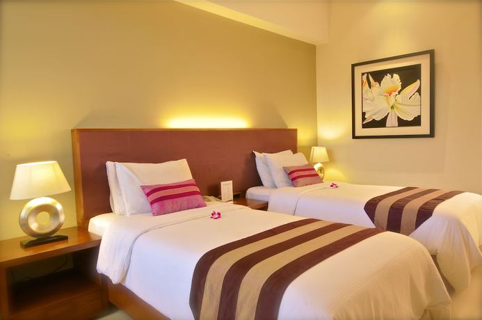 Imagen de la habitación del Hotel Anggrek Shopping Hotel. Foto 9