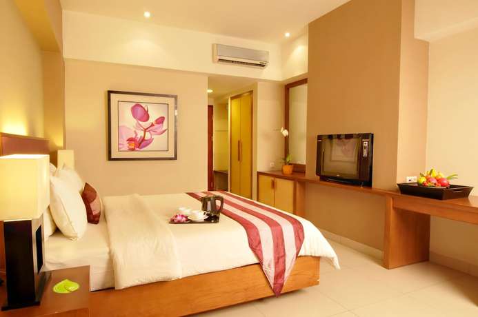 Imagen de la habitación del Hotel Anggrek Shopping Hotel. Foto 11