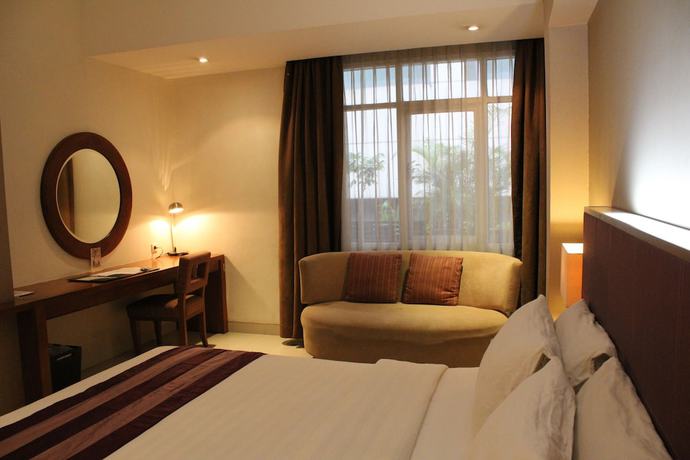 Imagen de la habitación del Hotel Anggrek Shopping Hotel. Foto 13