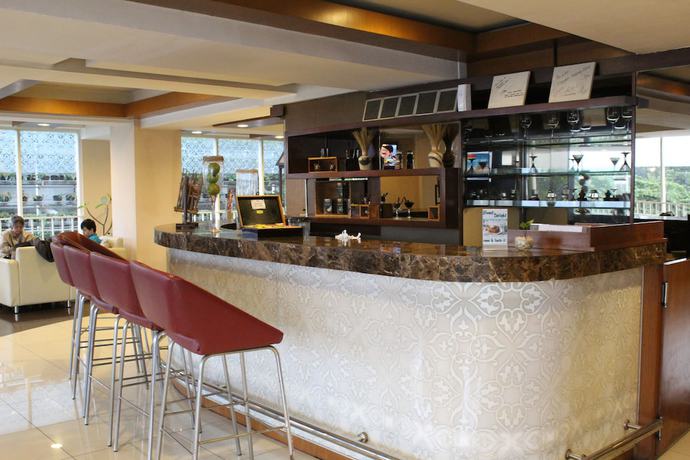 Imagen del bar/restaurante del Hotel Anggrek Shopping Hotel. Foto 2